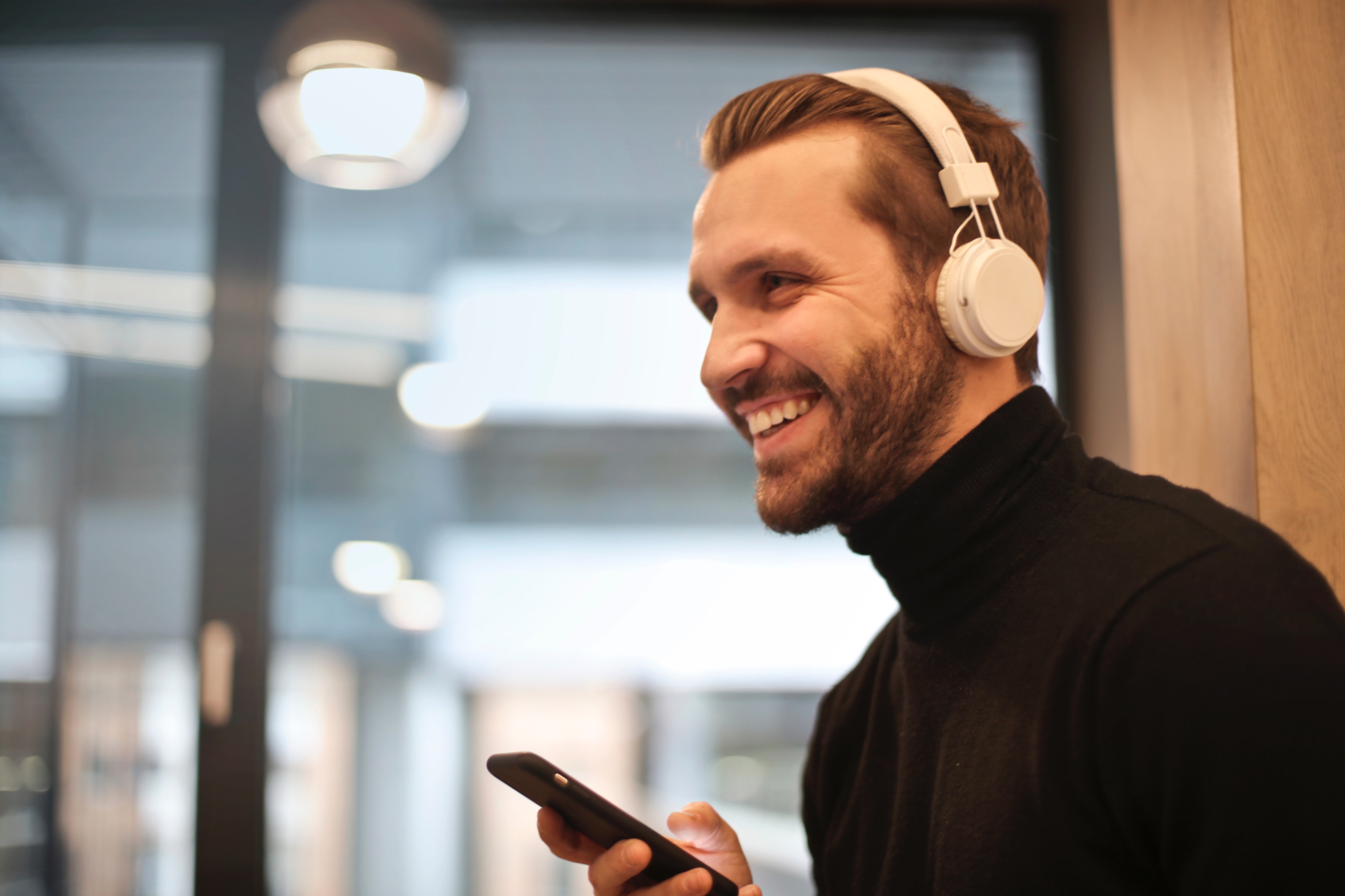 headphones man podcasts happy